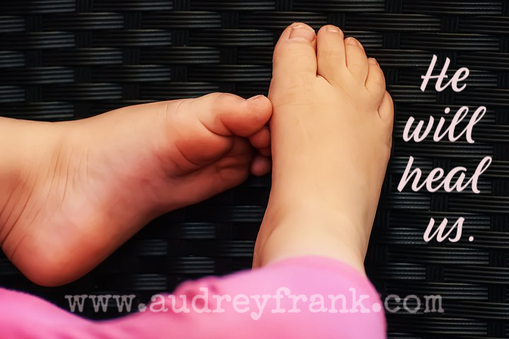 A picture of a child's feet. The words, "He will heal us," which describe the subject of the post.
