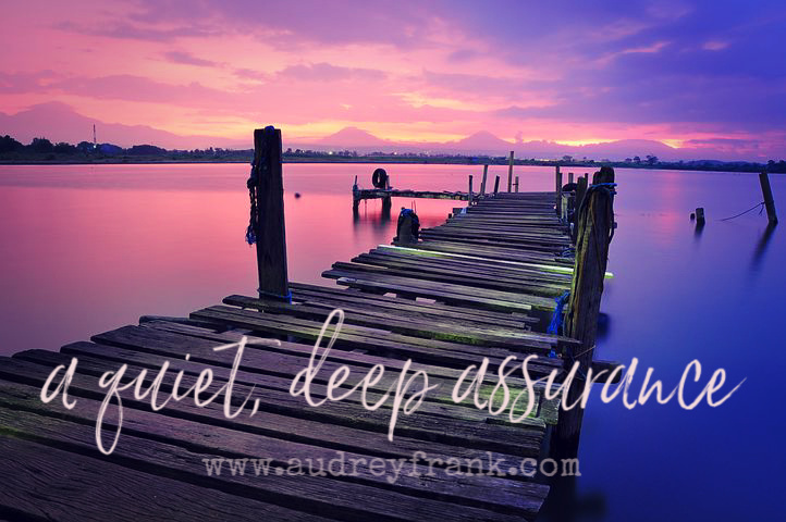 A jetty in quiet waters. The words "A Quiet, Deep Assurance" describe the subject of the article.
