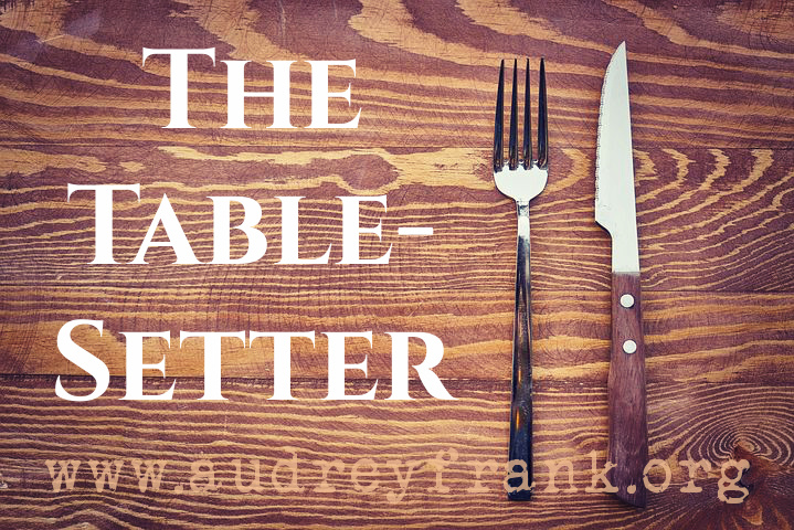 A table with knife and fork. The title, "The Table-Setter" to describe the subject of the post.