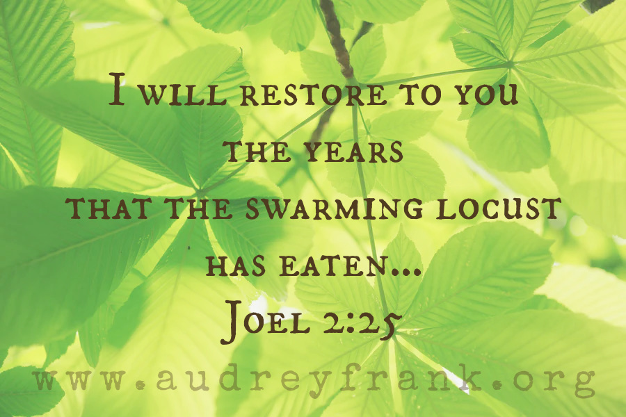 A green leafy background with the words I will restore to you the years that the swarming locust has eaten...
