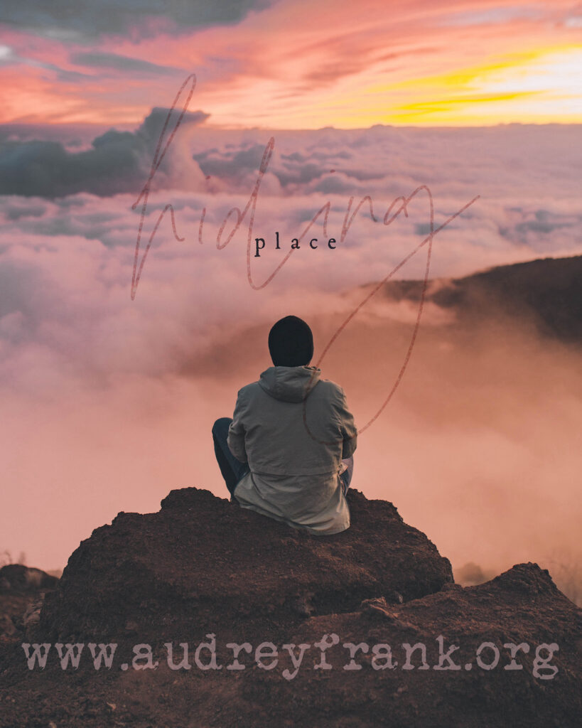 a person sitting on a rock high above the clouds with the words hiding place, describing the subject of the post.
