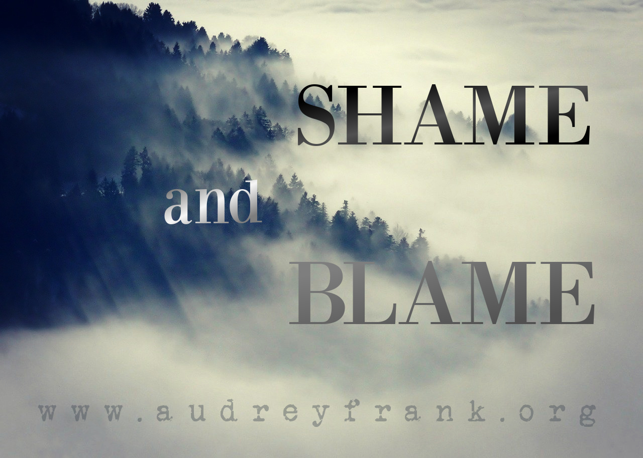 mountains shrouded in clouds with the words "Shame and Blame" describing the subject of the post.