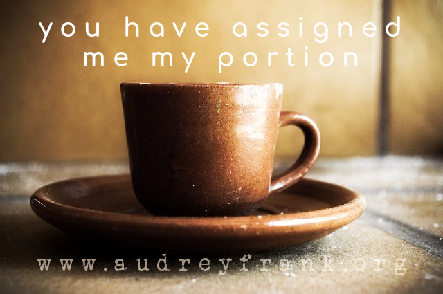 A cup and saucer with the words You have assigned me my portion