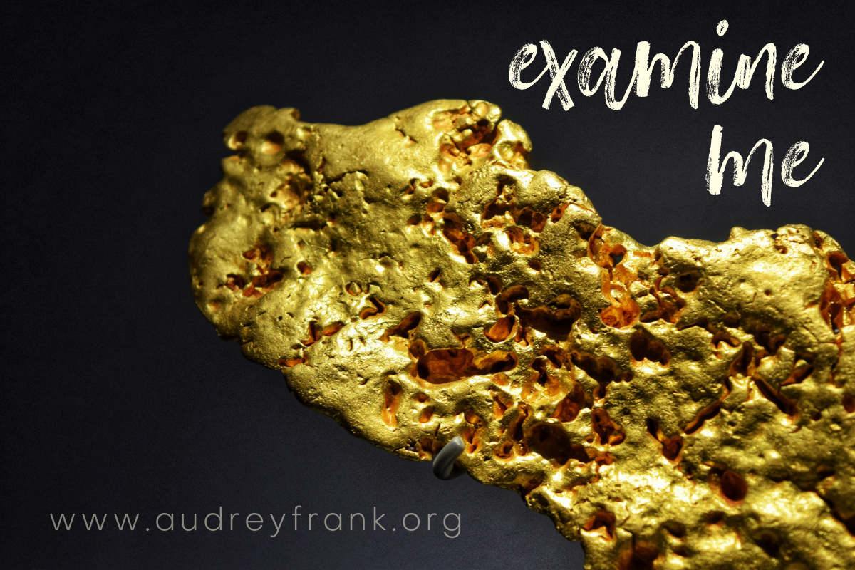 melted gold with the words 'examine me" describing the subject of the post.