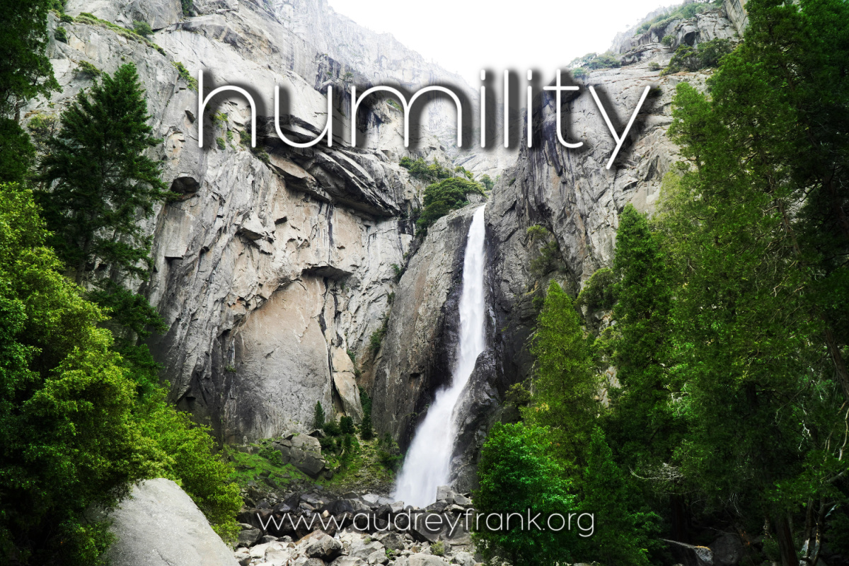 a waterfall from a mountain rock and the word "humility" describing the subject of the post. 
