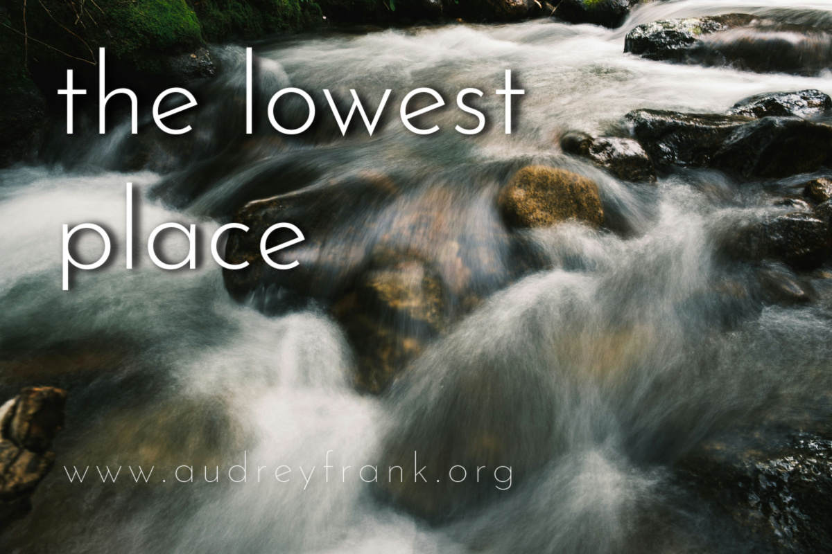 a rushing creek with the words "The Lowest Place" describing the subject of the post.